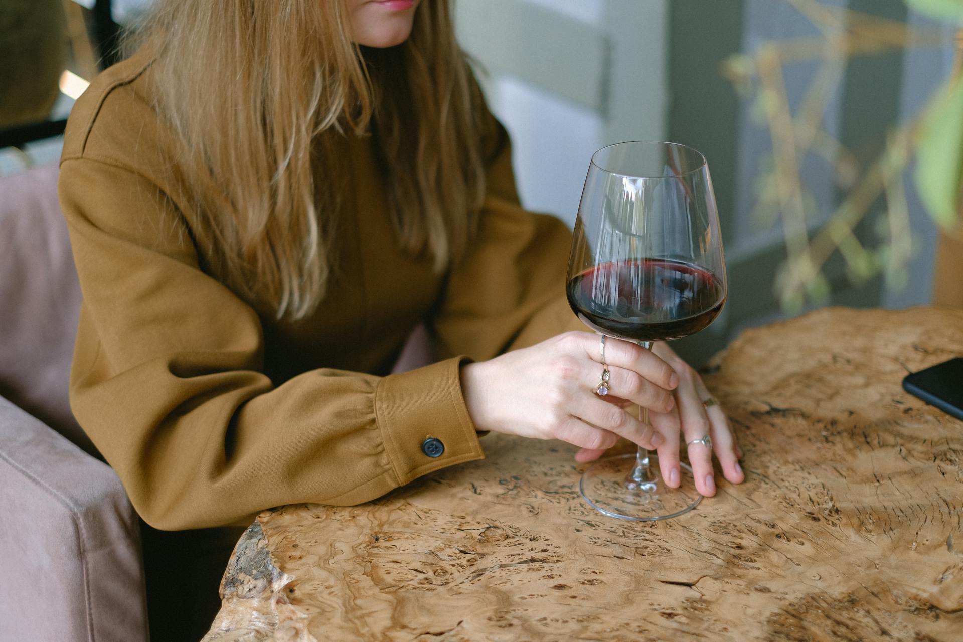 woman drinking glass of wine